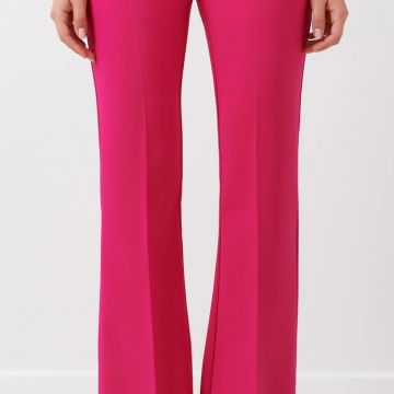 Pantaloni Mid Flared in tessuto tecnico color fuxia 1